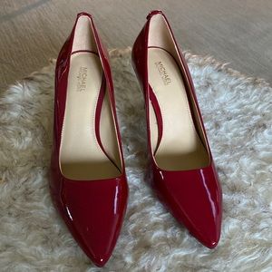 Gorgeous patent leather red pumps by Michael Kors